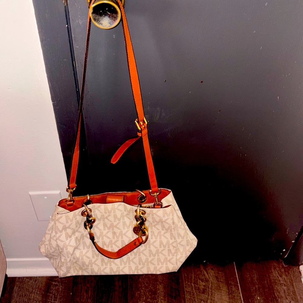 used Michael Kors monogram gold links bag